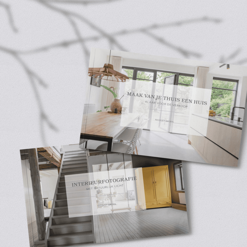 Books on interior photography and property styling with a cover featuring a bright, spacious kitchen and living room, captured by Nicolet Groen.