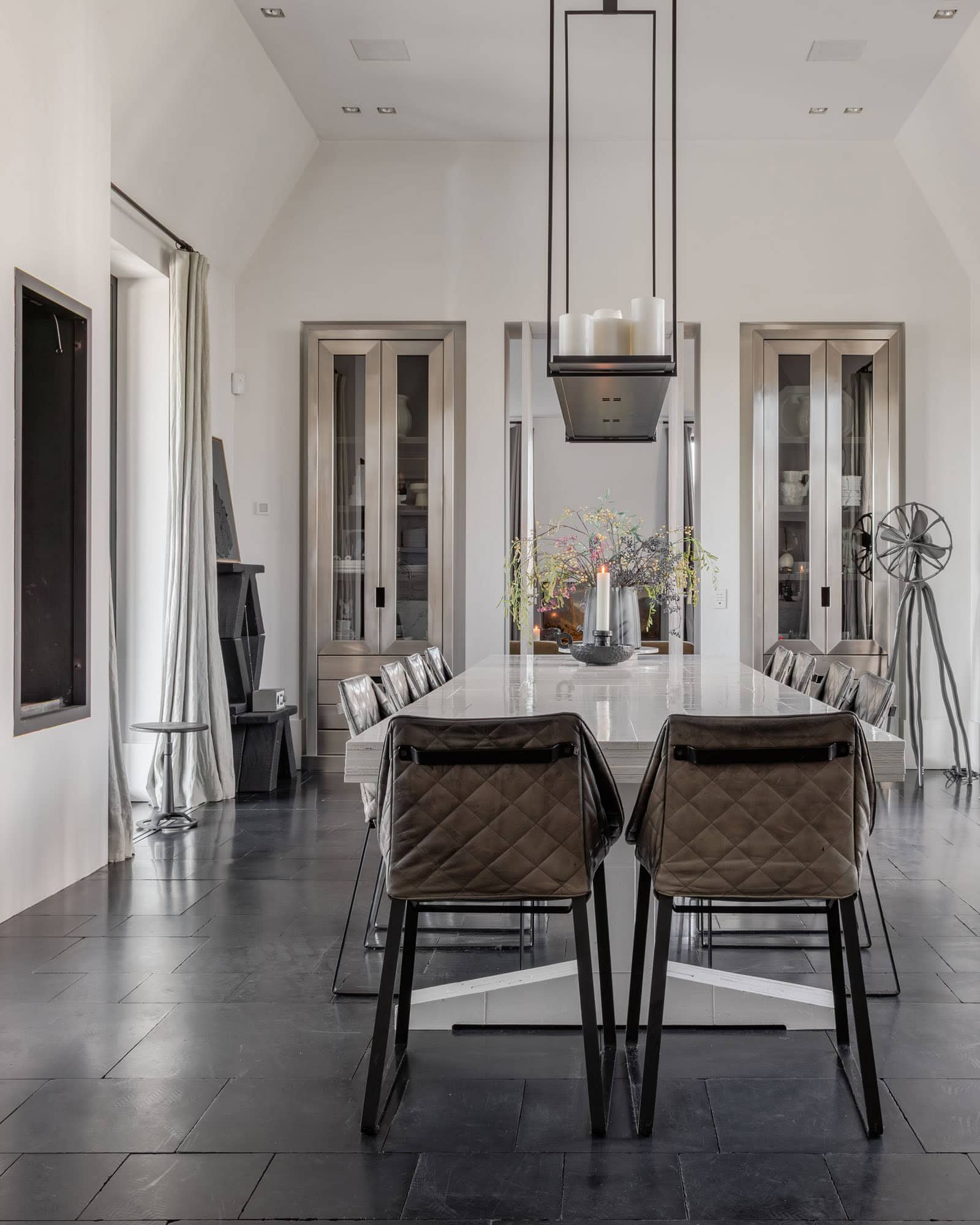 Diningroom with a high ceiling and a fire place