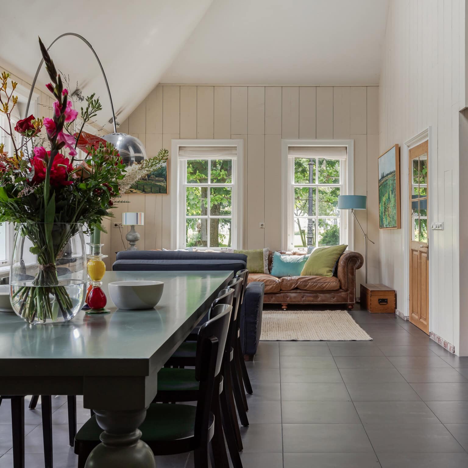 Living room in farmhouse must have an open ceiling. Real estate photography